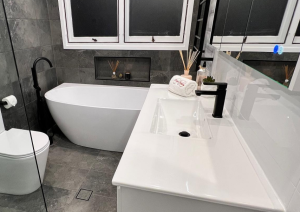 Freestanding bathtub installation during bathroom renovation Rectify Plumbing