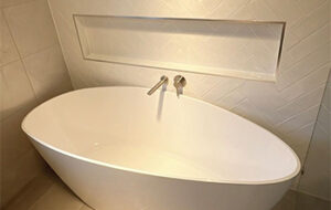 New tap installation against blue tile bathroom Rectify Plumbing