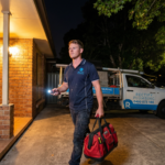 Emergency plumber arriving at Hornsby NSW home at night for burst pipe callout — Rectify Plumbing 24/7